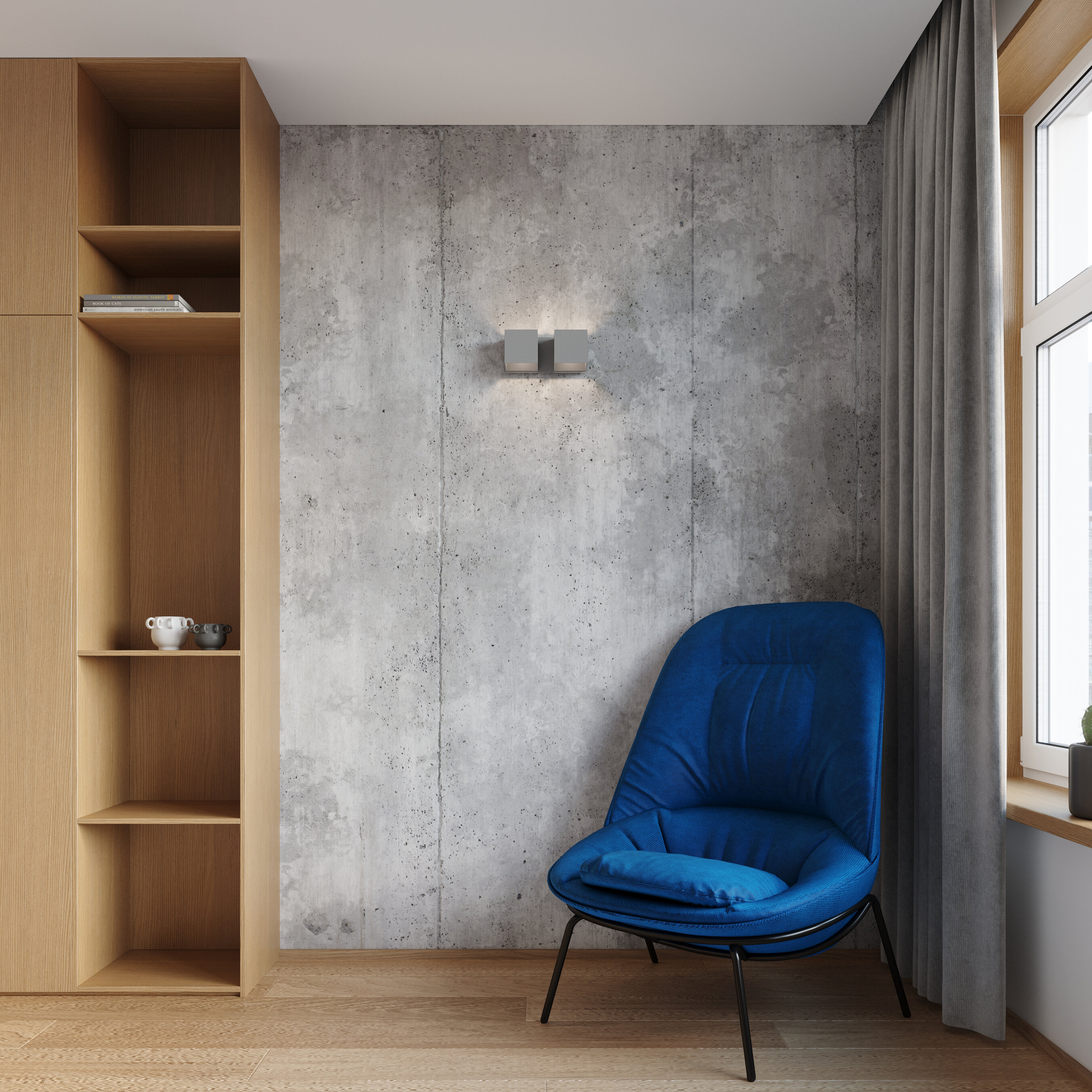 Graue Wandleuchten an einer  Betonwand in einem Zimmer mit einem blauen Stuhl.